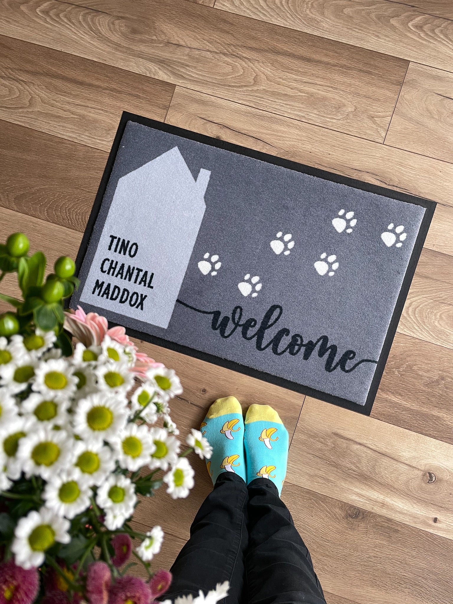 Fußmatte mit Pfoten und Haus